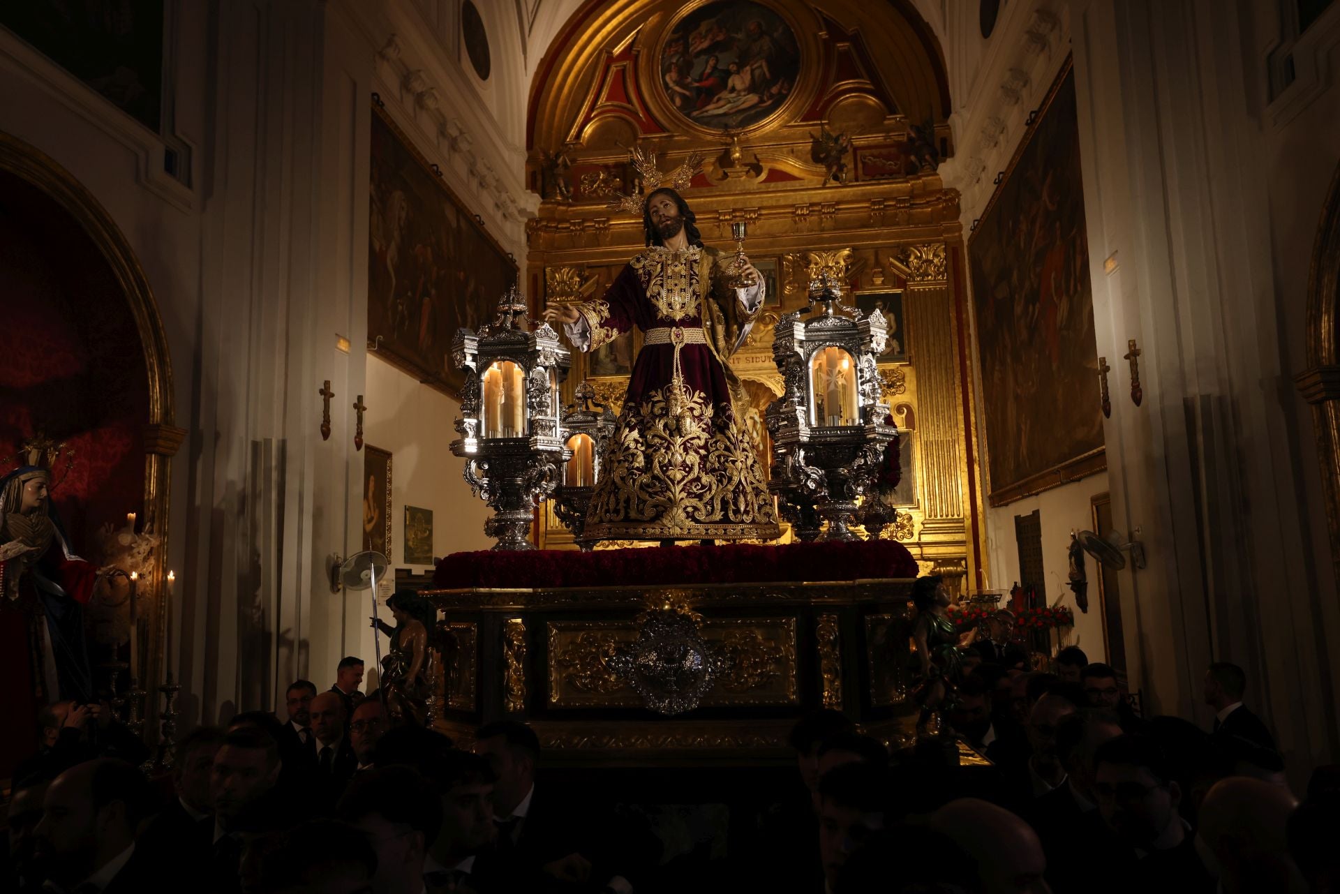 El vía crucis de la Agrupación de Cofradías de Málaga, en imágenes