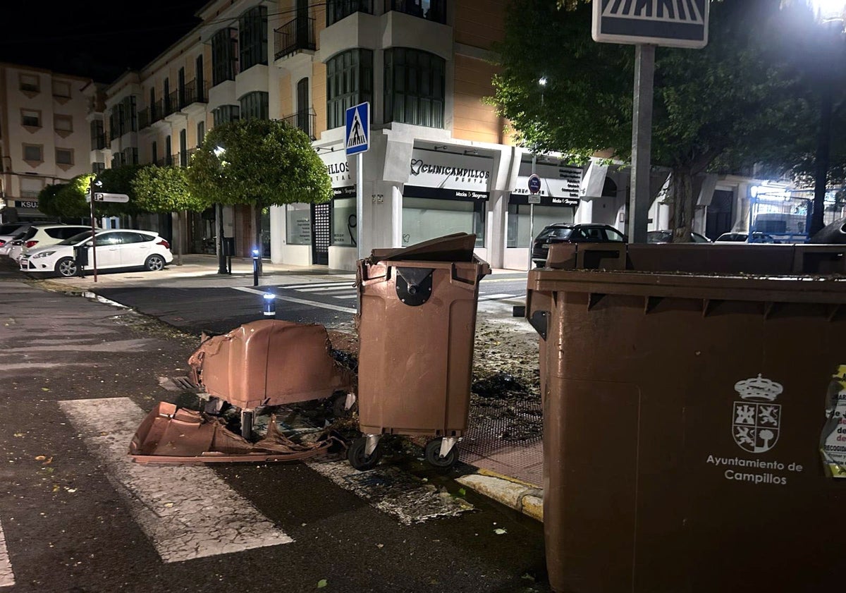 Imagen principal - El apagón deja una veintena de contenedores calcinados y daños leves en varios vehículos de Campillos