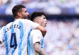 Galilea y Antoñito celebran el único gol del partido, obra de este.