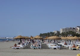 Turistas, en Torremolinos.
