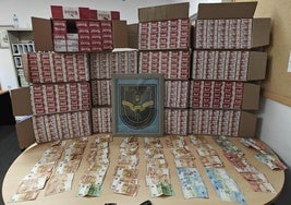 Tabaco y dinero decomisado.