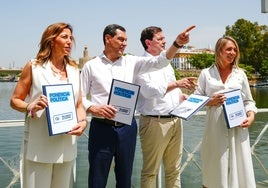 Natalia Chueca, Juanma Moreno, Alfonso Fernández Mañueco y Alma Ezcurra, este martes en Sevilla.