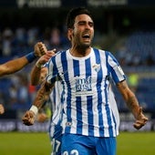 Escassi celebra un gol con el Málaga.
