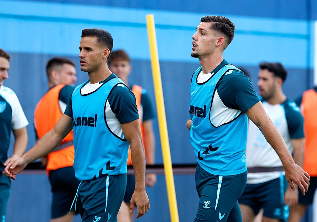 Luismi y Montero, en el entrenamiento del Málaga de este martes.