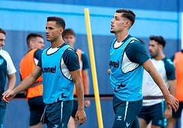 Luismi y Montero, en el entrenamiento del Málaga de este martes.