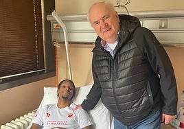 Tyson Carter y Bozidar Maljkovic, en el hospital de Belgrado.