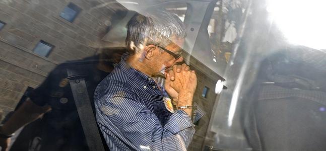 Francisco José Garzón Amo, en un coche policial. / Rafa Rivas (Afp)