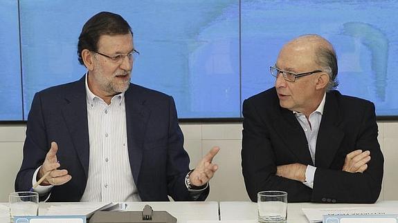 Mariano Rajoy y Cristóbal Montoro. 