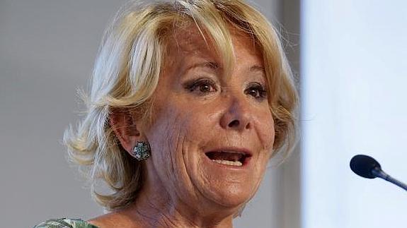 La presidenta del PP madrileño, Esperanza Aguirre, (iz)