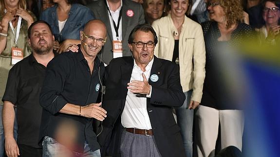 Oriol Junqueras, Raul Romeva y Artur Mas en el acto de cierre de campaña de 'Juntos por el Sí'.