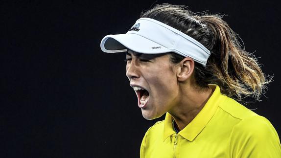 Garbiñe Muguruza celebra el triunfo.