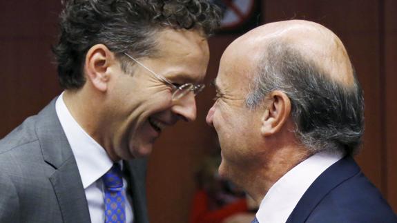 Dijsselbloem y De Guindos.