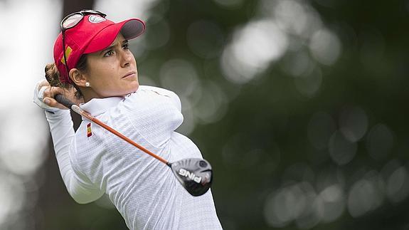 Muñoz golpea una bola durante su partido de ayer