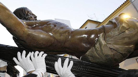 Sábado de traslados y devoción en las calles de Málaga