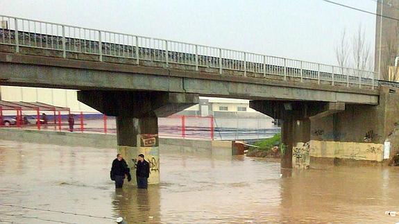 Zona inundada en el Polígono Guadalhorce tras unas intensas lluvias (archivo). 