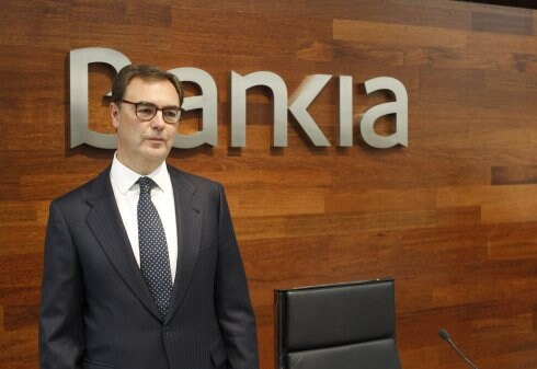 Los consejeros delegados del Popular, Francisco Gómez Martín, y de Bankia, José Sevilla. :: efe
