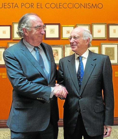 Amado Franco, expresidente de Ibercaja, y José Luis Aguirre. :: efe