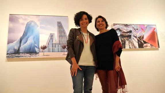 Las fotógrafas Nuria Murillo y Mercedes Higuero, entre dos de sus obras que fusionan arquitectura y naturaleza.