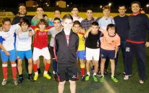 David Ramos, junto a sus compañeros de equipo y entrenadores. ::
JUANJO MACÍAS