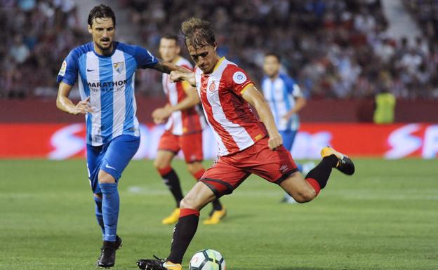 La ambición del Girona le otorga un triunfo histórico ante un gris Málaga