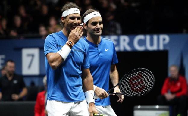 Nadal y Federer, durante el partido ante Querrey y Sock. 