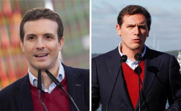 Pablo Casado (izq.) y Albert Rivera (dcha.) vestidos con jersey burdeos, camisa blanca y americana azul marino.