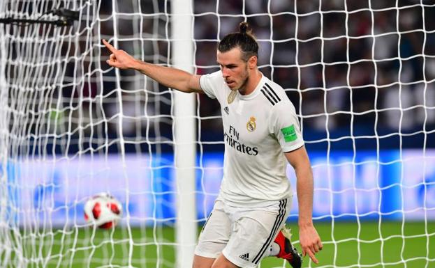 Bale celebra uno de sus goles al Kashima. 