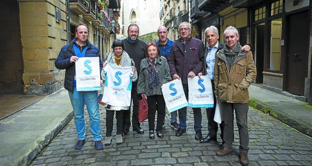 Miembros de la organización, de Afagi y del Ayuntamiento, en la presentación de la prueba. 