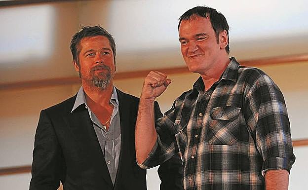 Imagen principal - Brad Pitt y Quentin Tarantino, en el Kursaal, durante el Zinemaldia de 2009. Las obras de construcción del Kursaal duraron cuatro años.Ópera 'Un ballo in maschera', de la Quincena.