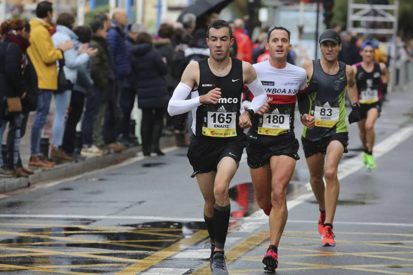 Fotos: Las llegadas a meta de los participantes en la Behobia - San Sebastián