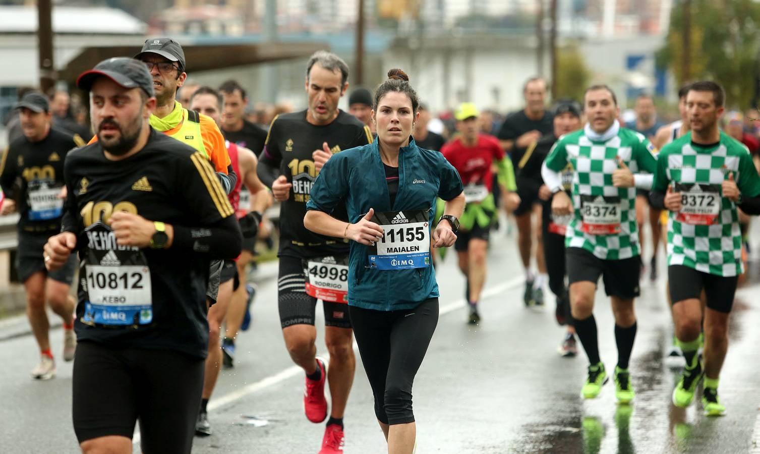 Fotos: Los corredores, a su paso por Pasaia y Herrera en la Behobia - San Sebastián