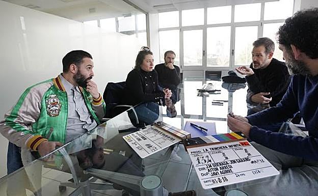 Los protagonistas durante la charla.