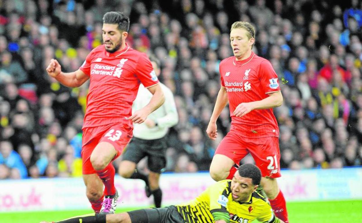 El capitán del Watford, Troy Deeney (d). 