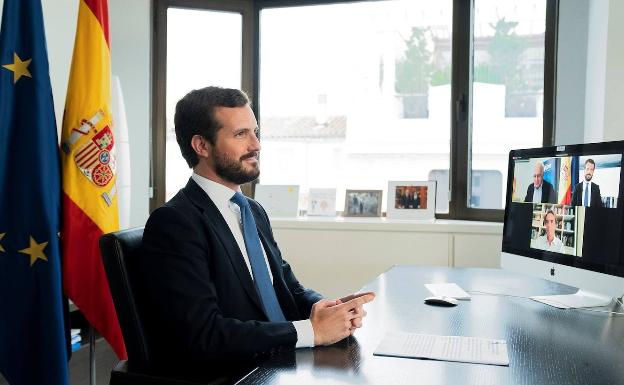 Imagen cedida por el PP de la intervención de Casado en un encuentro telemático de FAES. 