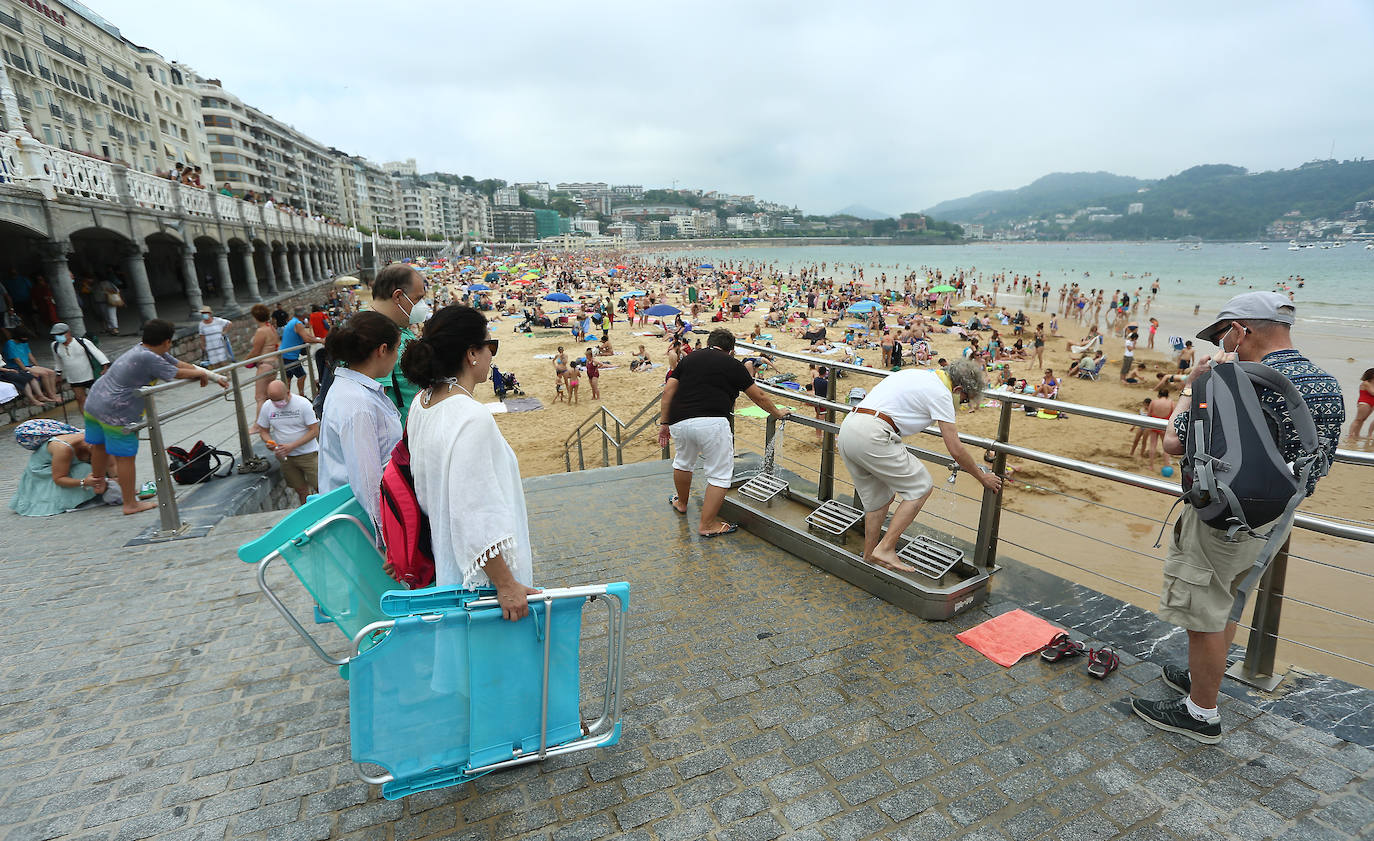 Fotos: Un domingo caluroso y a remojo