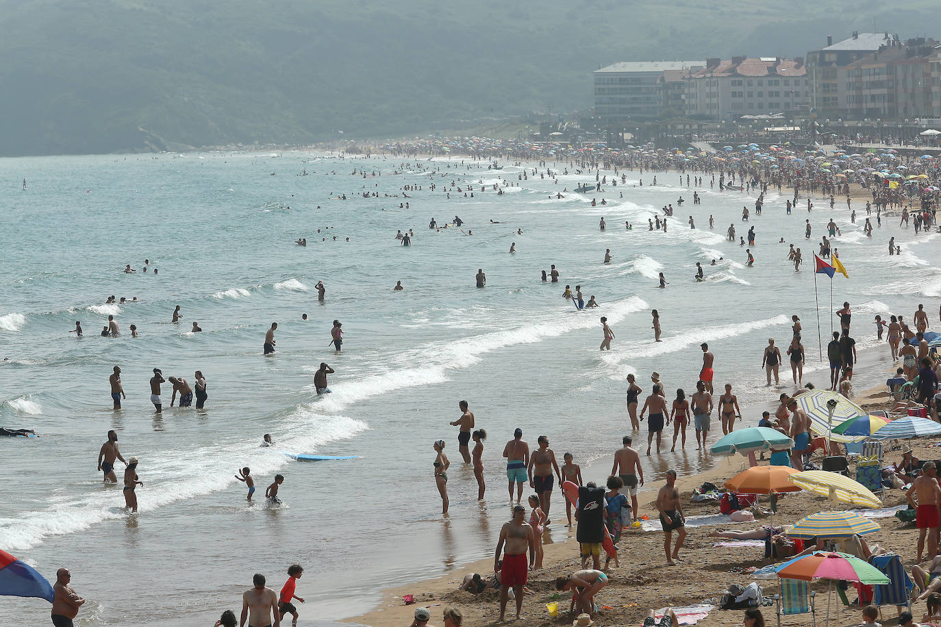 Fotos: Un domingo caluroso y a remojo