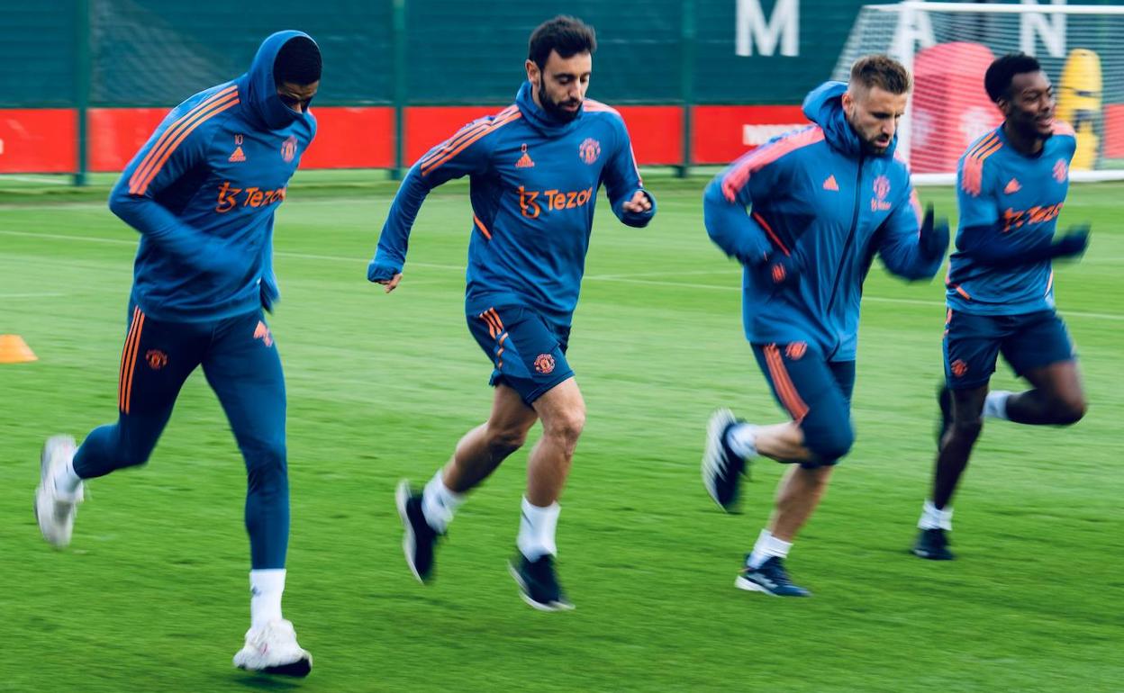 Los jugadores del Manchester United, entrenando.