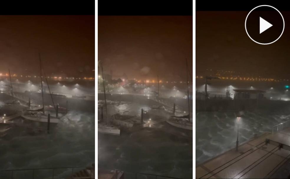 Intenso viento y olas en el Puerto de San Sebastián esta madrugada.