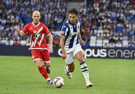 Isi y Zubimendi, durante el partido de la primera vuelta disputado en el Reale Arena.