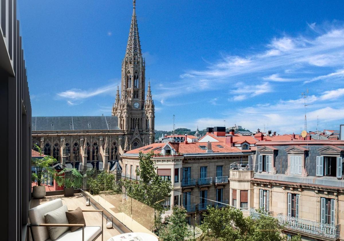 Imagen principal - Una promotora triplicará el número de pisos de un edificio del Ensanche de Donostia tras su reconstrucción