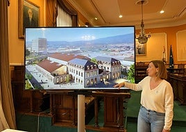 La alcaldesa, Cristina Laborda, junto a la inforgrafía que recoge el aspecto aproximado que se le quiere dar a la antigua Aduana.