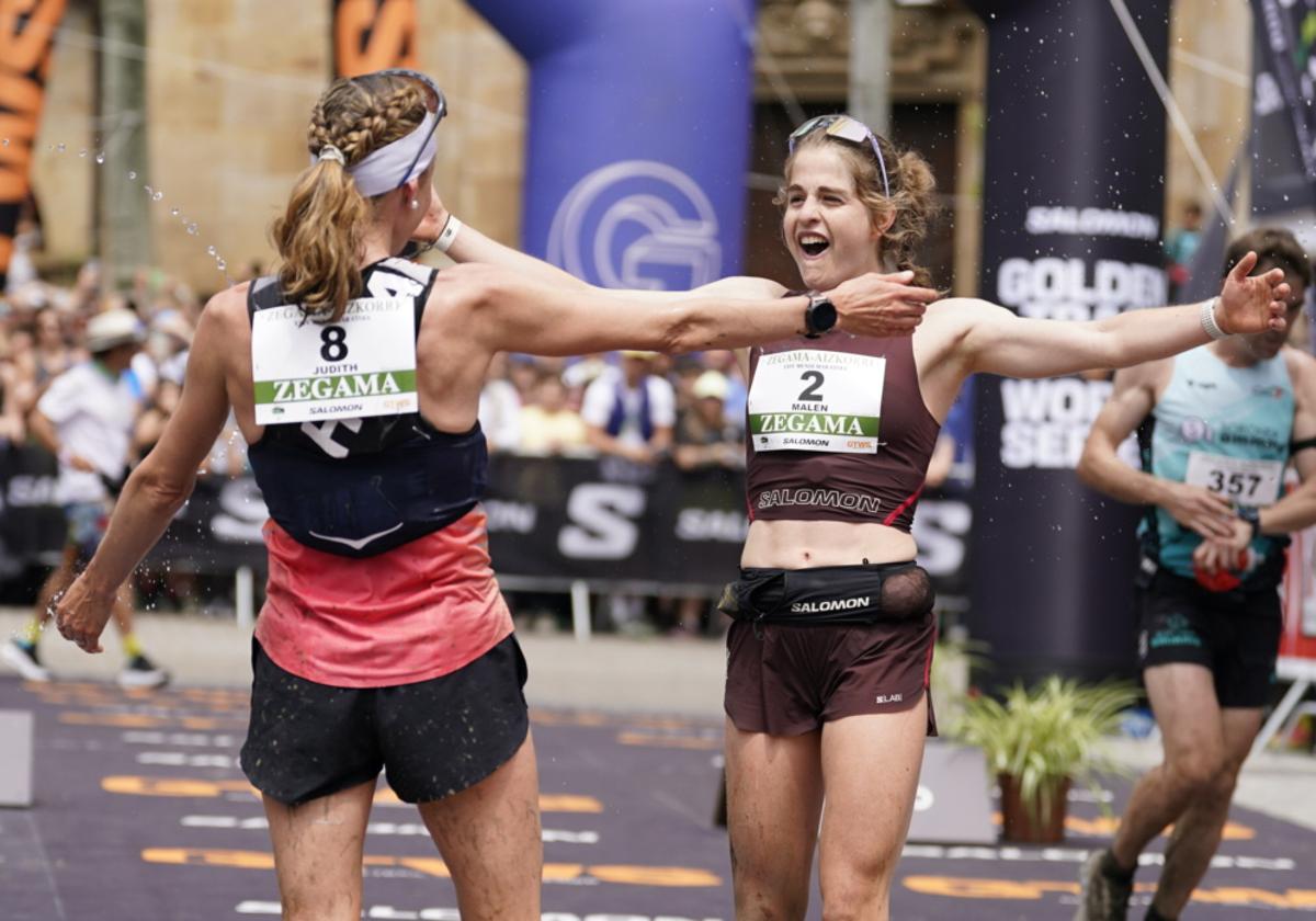La oñatiarra Malen Ola se abraza con la suiza Judith Wyder en la llegada de Zegama.