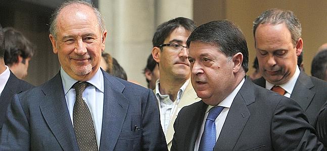 Rodrigo Rato, junto al exvicepresidente, José Luis Olivas. / Foto: Efe | Vídeo: Ep