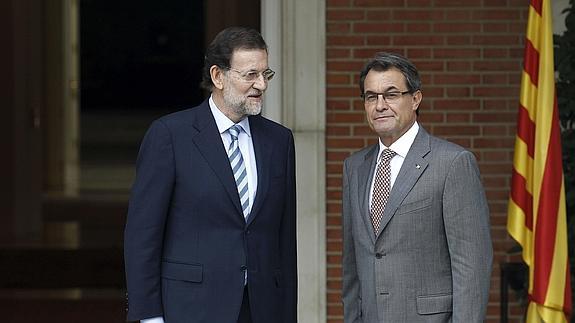 Rajoy, con Mas.