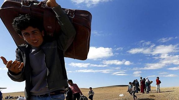 Refugiados sirios cerca de la frontera con Turquía 