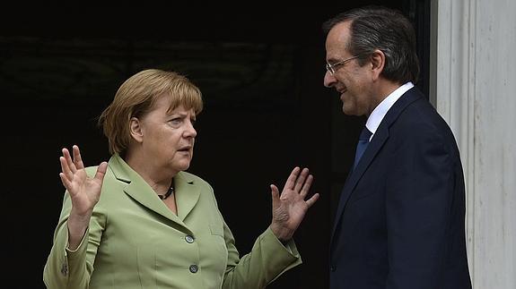 Angela Merkel y Andonis Samarás. 