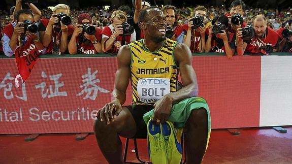 Usain Bolt celebra el triunfo. 