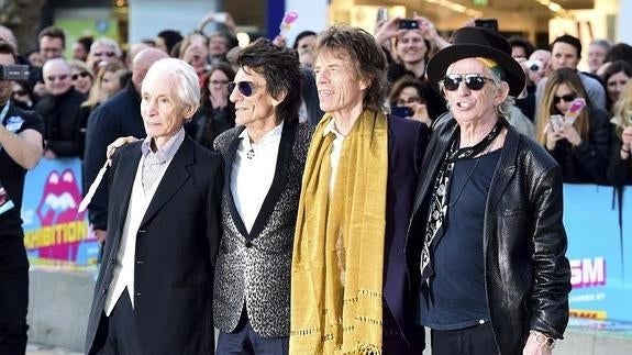 Charlie Watts, Ronnie Wood, Mick Jagger y Keith Richards, a su llegada a la gala de inauguración de la exposición 