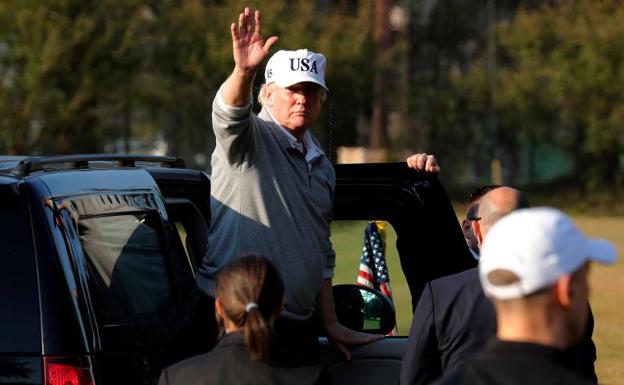 Trump, después de jugar al golf con Abe. 