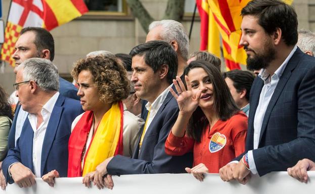 Los líderes de Ciudadanos y del PP, durante la marcha.